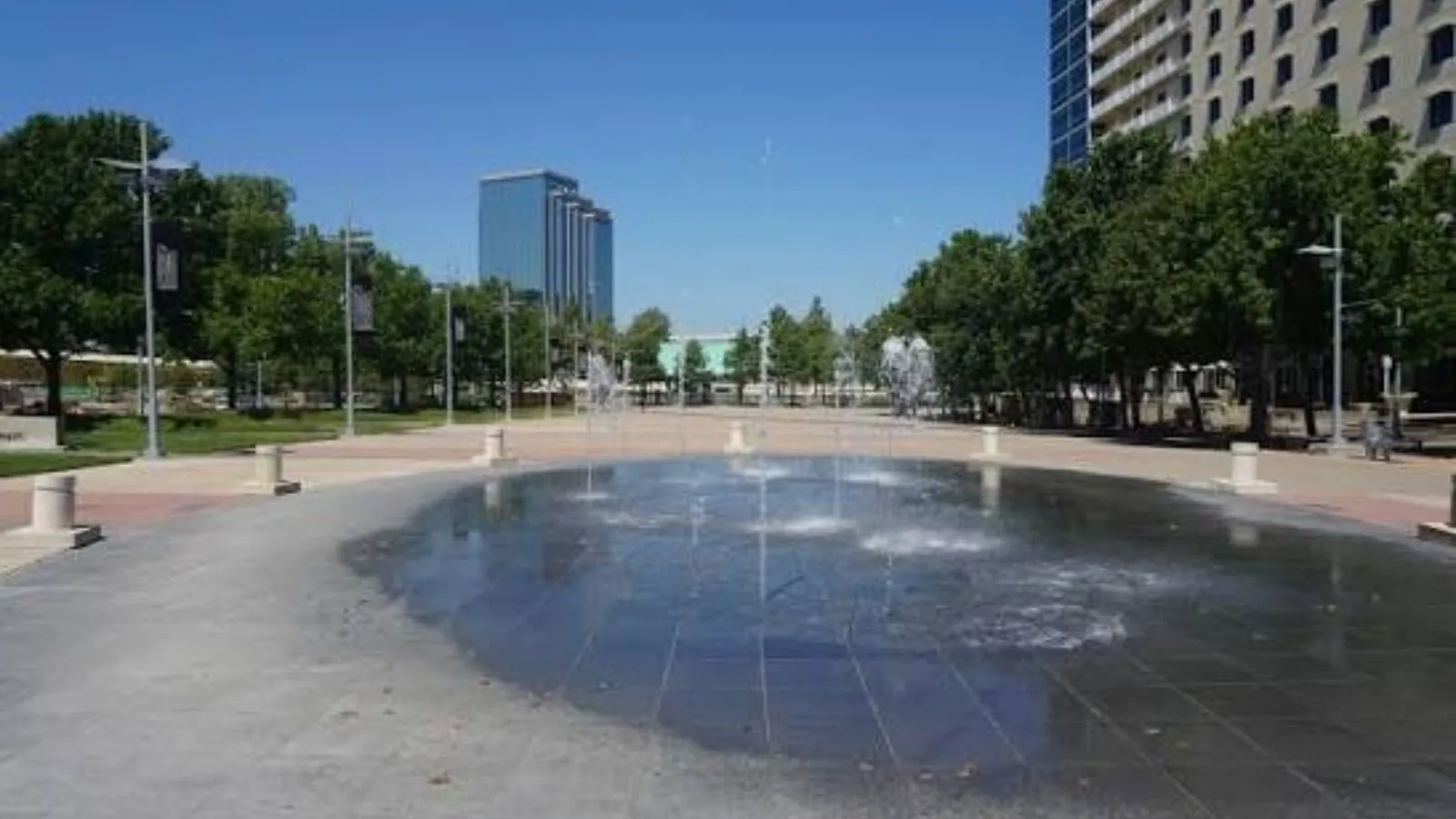 Fountain plaza with office towers in Richardson, TX